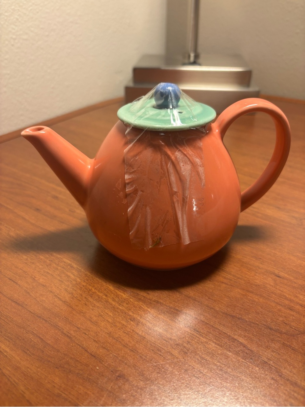 Ceramic Orange Teapot with Mint Green Lid and Blue Knob